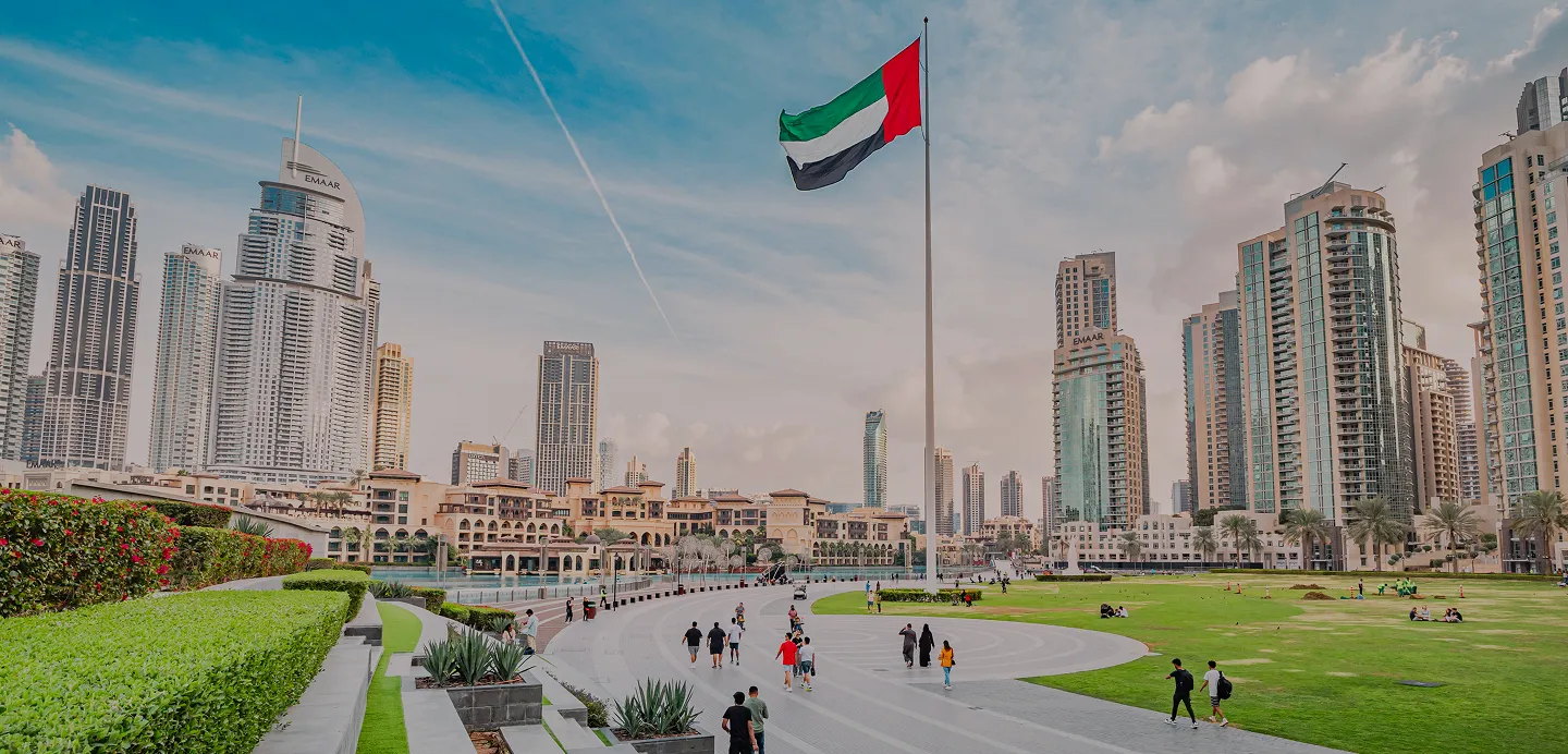Downtown Dubai skyline with the UAE flag